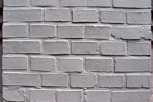vieux mur de briques. texture du vieux fond panoramique de mur de brique patiné photo