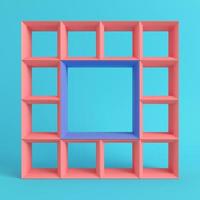 étagères carrées vides sur fond bleu vif dans des tons pastel photo