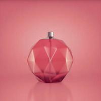 bouteille de parfum sur fond rose photo