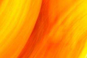 fond incandescent lumineux dans les tons orange, jaune, rouge. demi-cercles. photo