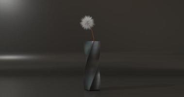fleur de linaigrette dans un vase noir photo