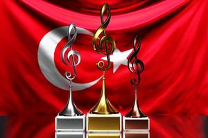prix de la clé de sol pour avoir remporté le prix de la musique sur fond de drapeau national de la turquie, illustration 3d. photo