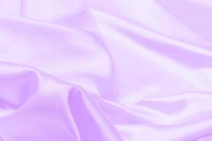texture de tissu satiné violet proton arrière-plan flou doux photo