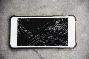 affichage des dommages fissurés de l'arrière-plan du téléphone mobile photo