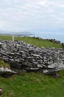 Ruines de hutte de ruche de clochan en Irlande photo