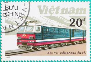 des timbres-poste imprimés au vietnam montrent un train de locomotives diesel photo