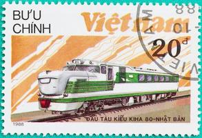 des timbres-poste imprimés au vietnam montrent un train de locomotives diesel photo