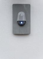 sonnerie électrique moderne avec symbole bleu. photo