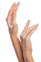 mains féminines et crème hydratante photo