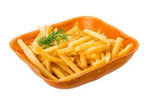 frites dans un bol sur fond blanc photo