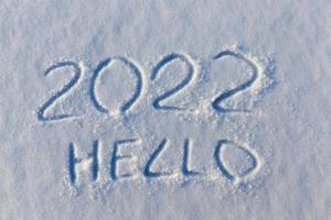 l'inscription sur la nouvelle année 2022 sur la neige en hiver photo