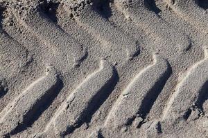 empreintes de pas dans le camion de sable photo