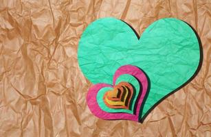 carte de voeux, saint valentin, coeur et cupidon sur papier textur photo