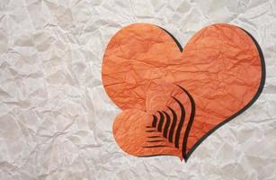 carte de voeux, saint valentin, coeur et cupidon sur papier textur photo