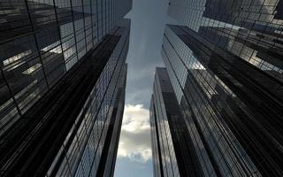 immeubles de grande hauteur modernes contre le ciel. illustration 3d sur le thème du succès commercial et de la technologie photo