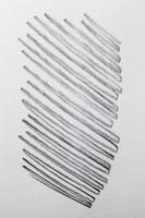 lignes grises chaotiques dessinées au crayon sur papier ordinaire photo