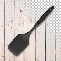 spatule de chef en silicone noir sur fond de bois transparent. photo