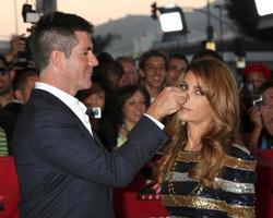 los angeles, 14 septembre - simon cowell, paula abdul arrivant à la première projection de x-factor au théâtre arclight le 14 septembre 2011 à los angeles, ca photo