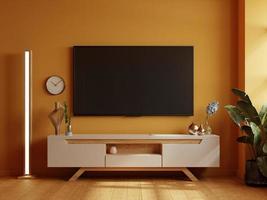 salle de télévision sur fond de mur jaune, décor de salon moderne avec un meuble de télévision en bois.