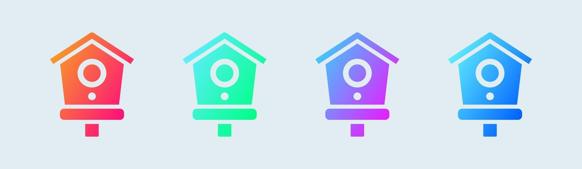 icône solide de maison d'oiseau dans des couleurs dégradées. nichoir signe illustration vectorielle. vecteur