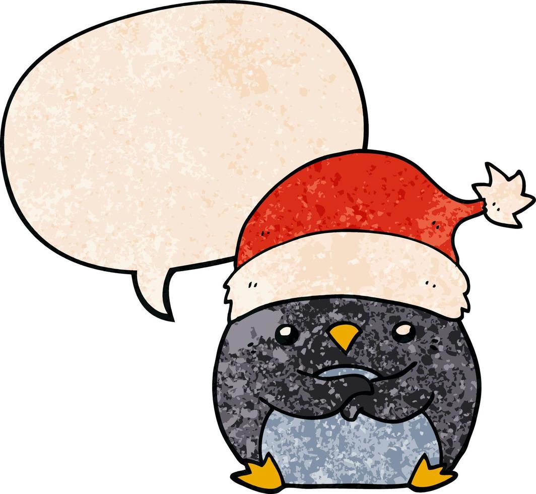 pingouin de dessin animé mignon portant un chapeau de noël et une bulle de dialogue dans un style de texture rétro vecteur