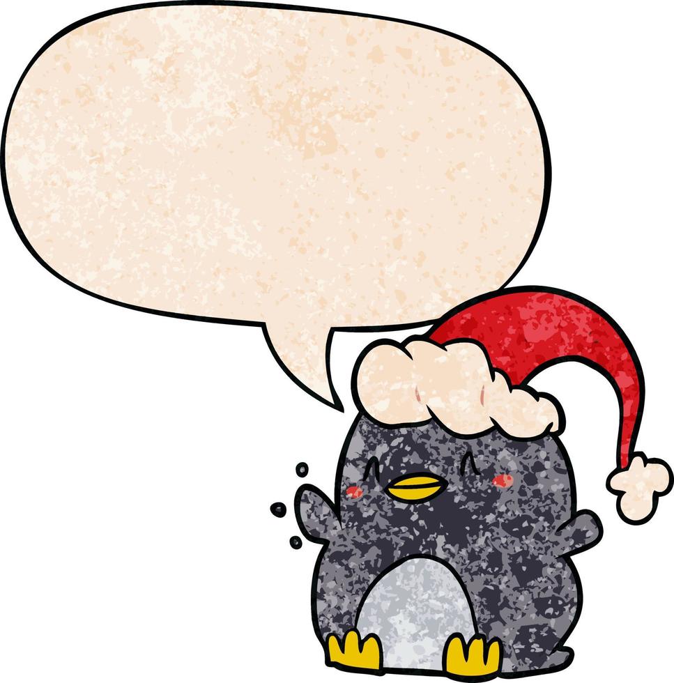 pingouin de dessin animé portant un chapeau de noël et une bulle de dialogue dans un style de texture rétro vecteur