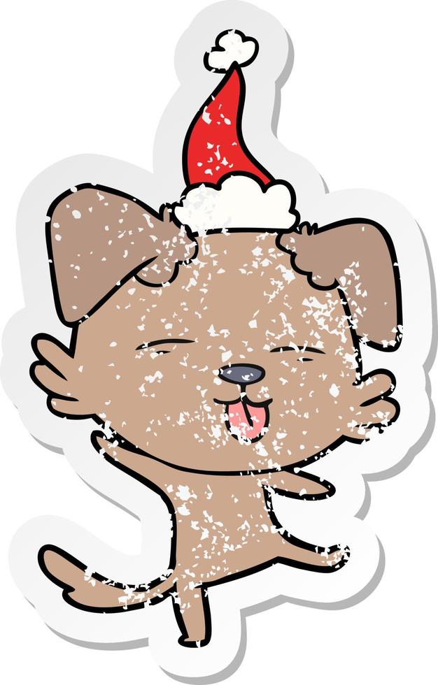 dessin animé autocollant en détresse d'un chien dansant portant un bonnet de noel vecteur