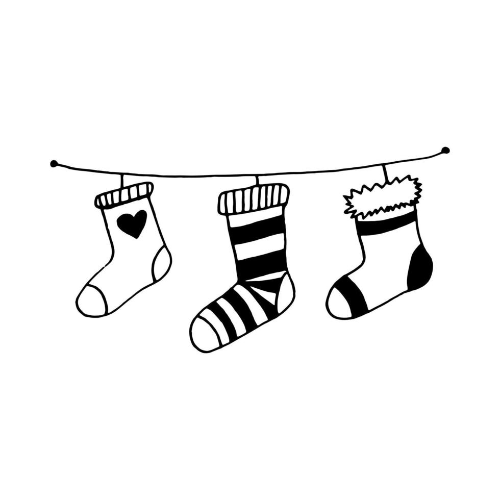 chaussettes pour les cadeaux de Noël. décor suspendu dessiné à la main dans un style doodle vecteur