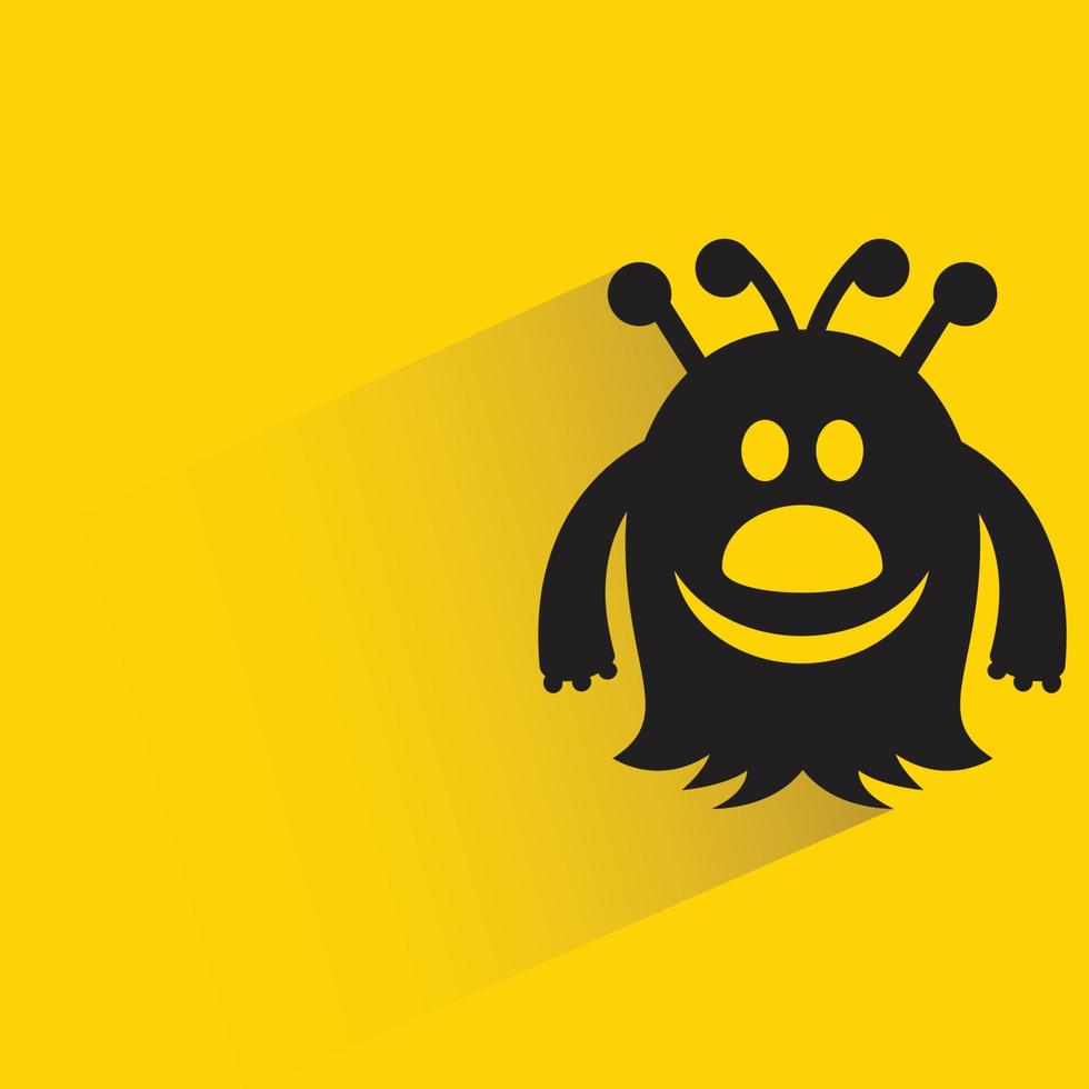 personnage de monstre mignon avec ombre sur fond jaune vecteur