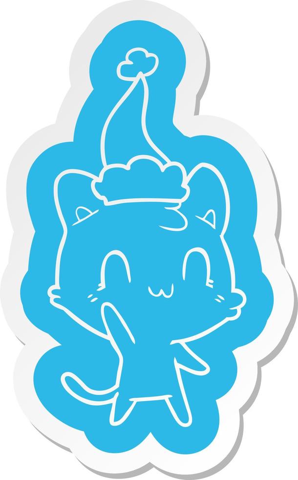 autocollant de dessin animé d'un chat heureux portant un bonnet de noel vecteur