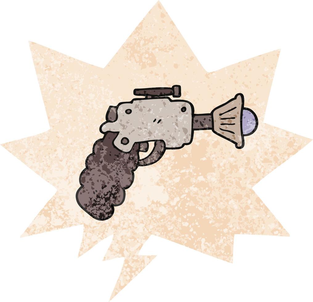 pistolet à rayons de dessin animé et bulle de dialogue dans un style texturé rétro vecteur