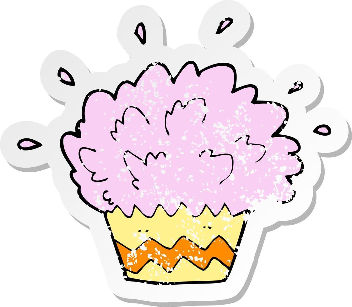 autocollant rétro en détresse d'un cupcake explosant de dessin animé vecteur