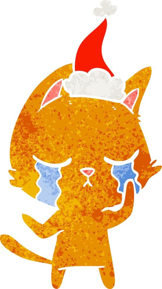 dessin animé rétro pleurant d'un chat portant un bonnet de noel vecteur