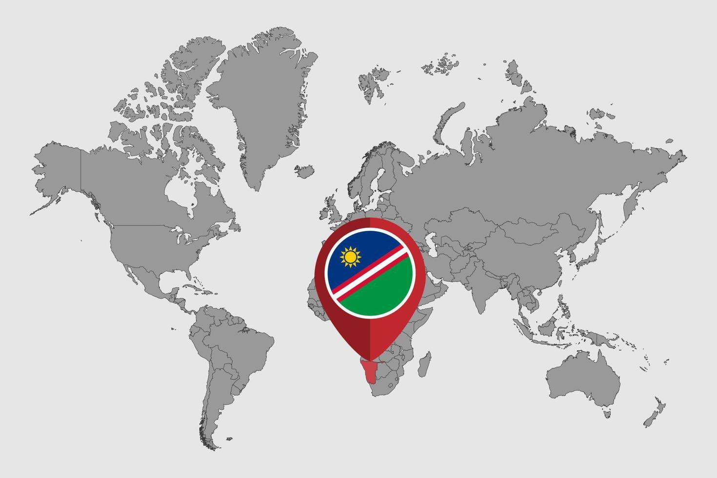 épinglez la carte avec le drapeau de la namibie sur la carte du monde. illustration vectorielle. vecteur