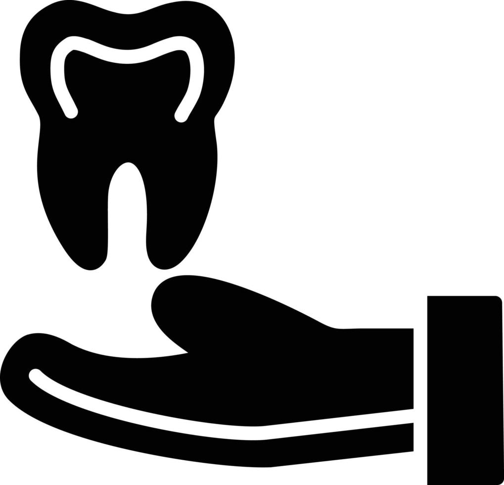 icône de glyphe de dent dans la main vecteur