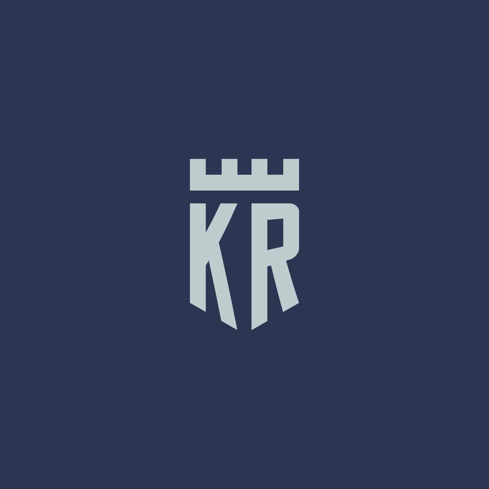 monogramme du logo kr avec un château de forteresse et un design de style bouclier vecteur