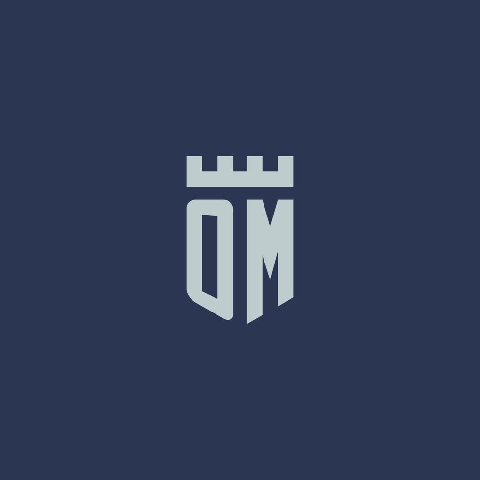 monogramme du logo om avec un château de forteresse et un design de style bouclier vecteur