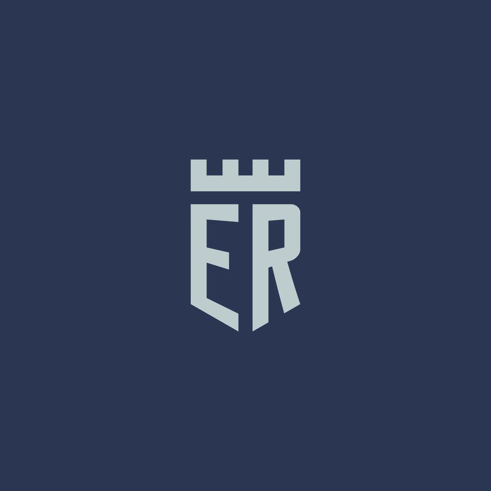 monogramme du logo er avec un château de forteresse et un design de style bouclier vecteur