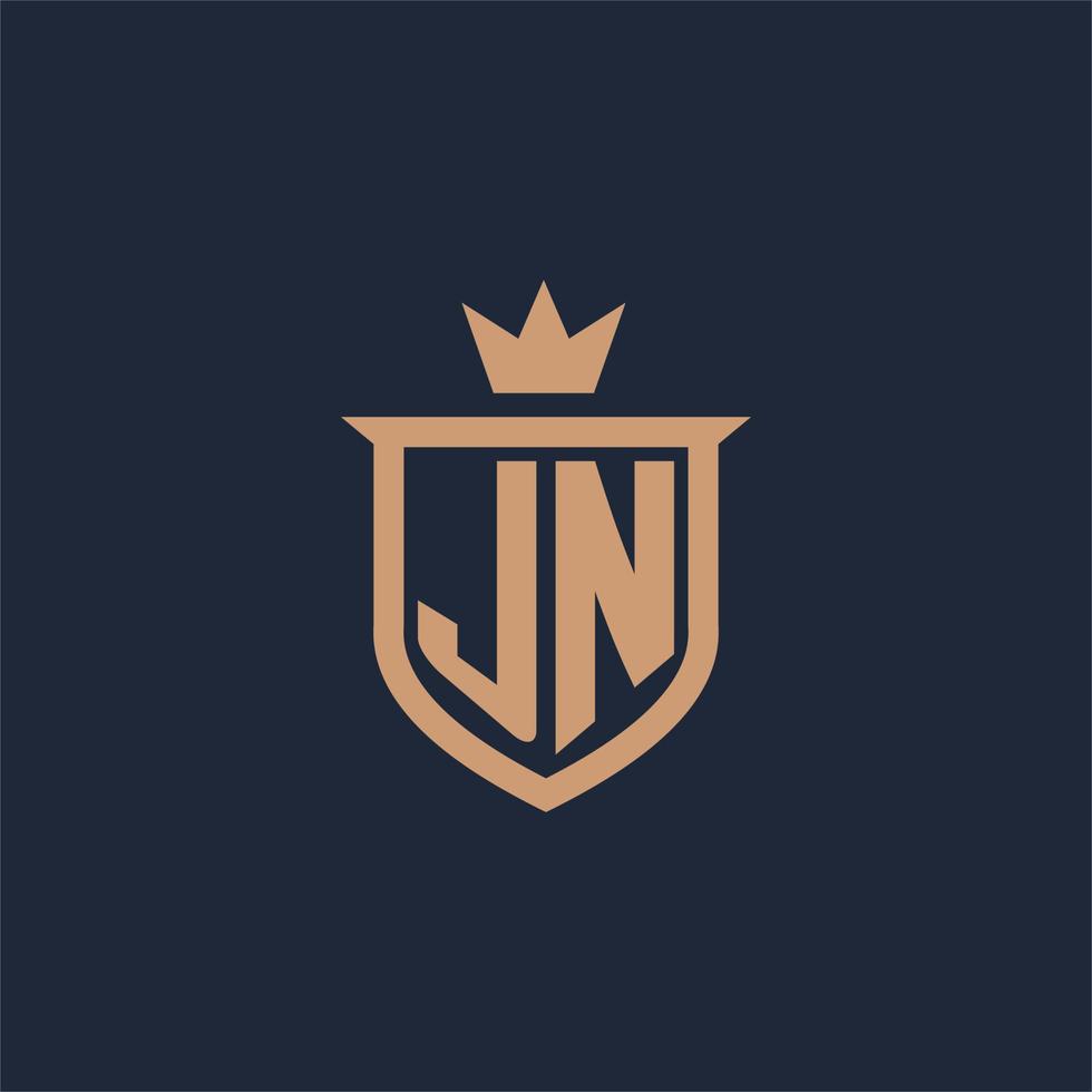 logo initial monogramme jn avec style bouclier et couronne vecteur