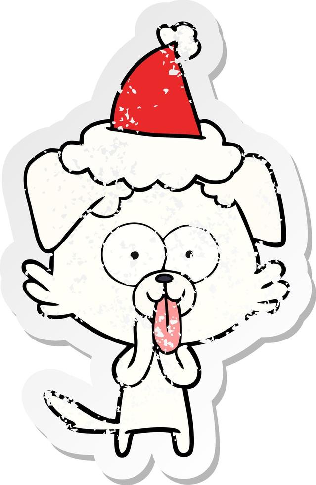dessin animé autocollant en détresse d'un chien avec la langue qui sort portant un bonnet de noel vecteur