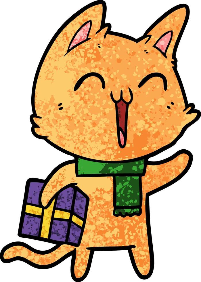 chat de dessin animé heureux avec un cadeau de Noël vecteur