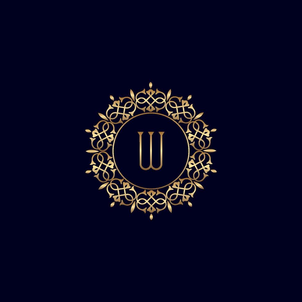 w logo de luxe royal orné d'or vecteur