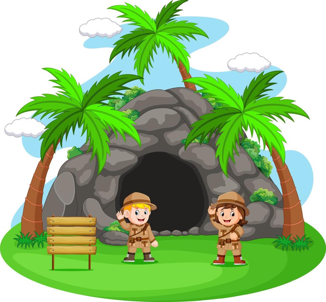 deux aventuriers devant la grotte vecteur
