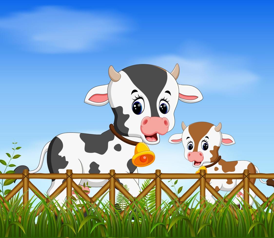 la vue naturelle avec la vache et sa petite vache jouant avec le visage heureux vecteur