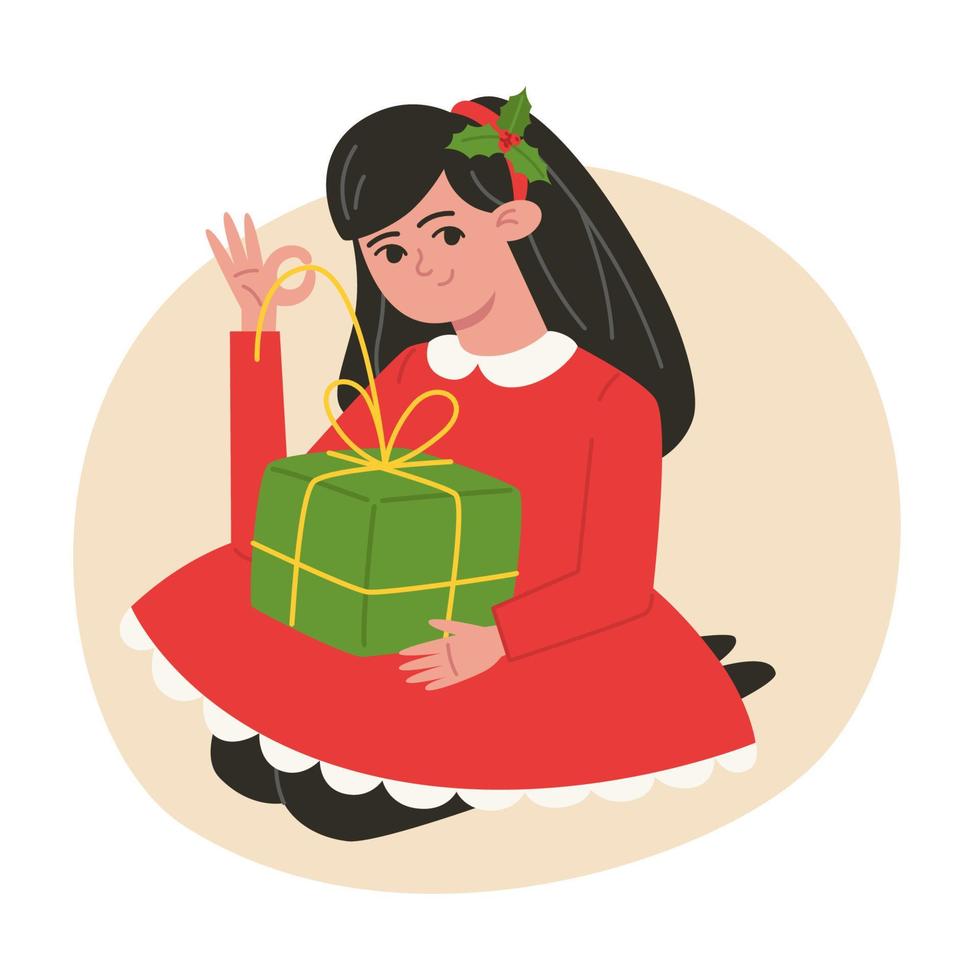 fille tenant une illustration de cadeau de noël dans un style plat vecteur