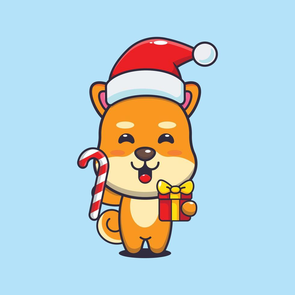 mignon chien shiba inu tenant des bonbons et des cadeaux de noël. illustration de dessin animé de noël mignon. vecteur