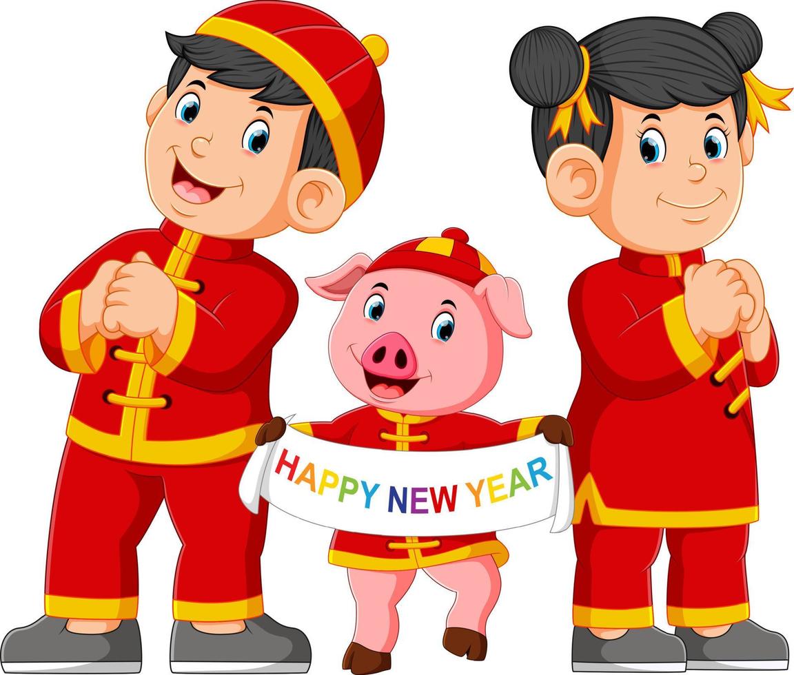 deux enfants avec un cochon rose saluent le nouvel an chinois vecteur