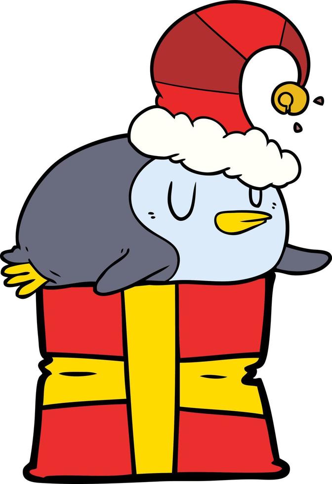 pingouin de dessin animé sur un cadeau de Noël vecteur