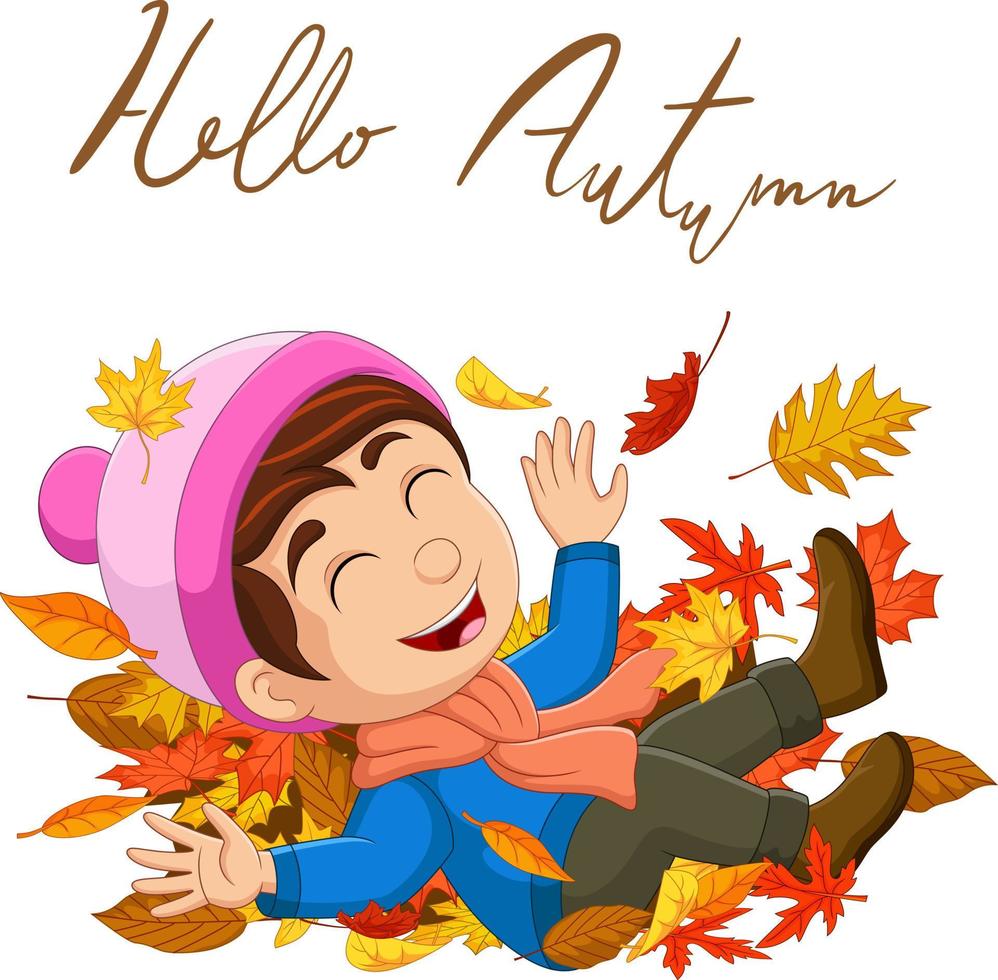 dessin animé heureux petit garçon avec des feuilles d'automne vecteur