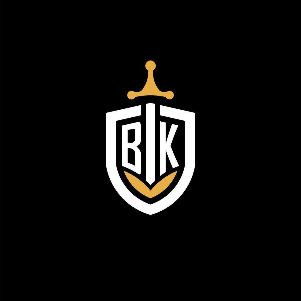 lettre créative bk logo gaming esport avec des idées de conception de bouclier et d'épée vecteur
